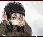  bangs black_hat blizzard blonde_hair blue_eyes closed_mouth commentary dirty_face eyebrows_visible_through_hair frown girls_und_panzer green_jumpsuit hands_on_headwear hat katyusha letterboxed long_sleeves pravda_military_uniform short_hair sketch snow tank_helmet tearing_up upper_body yuuyu_(777) 