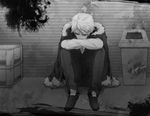  ane_(artist) bad_id bad_pixiv_id bangs borrowed_garments closed_eyes crate crossed_arms durarara!! fur-trimmed_jacket fur_trim greyscale head_rest heiwajima_shizuo jacket jacket_on_shoulders knees_up long_sleeves male_focus monochrome on_ground outdoors pants shoes sitting sleeping solo splatter sunglasses trash_can vest 