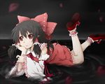  black_hair bow chin_rest detached_sleeves hair_bow hakurei_reimu jpeg_artifacts kagiana long_hair lying on_stomach red_eyes solo touhou 