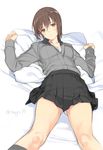  black_legwear blush bra breasts brown_hair cleavage girls_und_panzer kneehighs kuromorimine_school_uniform lying mibu_natsuki nishizumi_maho on_back parted_lips pillow pleated_skirt short_hair skirt small_breasts solo sweatdrop underwear 