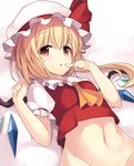  ascot blonde_hair bottomless commentary finger_to_mouth flandre_scarlet groin hat hat_ribbon highres janne_cherry looking_at_viewer midriff mob_cap navel no_panties out-of-frame_censoring puffy_short_sleeves puffy_sleeves ribbon shirt short_sleeves side_ponytail solo toned touhou vest white_day wings 