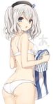 ass blue_eyes bra breasts employee_uniform hat highres holding_clothes kantai_collection kashima_(kantai_collection) komeshiro_kasu lawson long_hair looking_back medium_breasts open_mouth panties shirt silver_hair solo teeth twintails underwear underwear_only uniform 