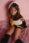  1girl child cosplay kagamine_rin kagamine_rin_(cosplay) laura_b looking_at_viewer photo pose ribbon solo uniform vocaloid watermark 