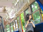  amatsuka_urara baby_princess black_hair camera ceiling_fan ichihi_(spinon) long_hair red_eyes sitting solo train_interior 