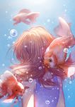  1girl arms_behind_back blue_dress bubbles fish floating from_behind goldfish red_hair solo underwater water 