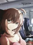  ahoge aircraft airplane bad_id bad_pixiv_id blonde_hair book breasts cleavage fate_(series) grey_eyes highres koha-ace looking_at_viewer medium_breasts okita_souji_(fate) okita_souji_(fate)_(all) paperfinger pillow seat smile solo 