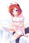  1girl alternate_costume arm_at_side arm_holding bangs bed blush closed_mouth cross eyebrows eyebrows_visible_through_hair garter_straps hand_on_own_arm hat highres holding_arm looking_at_viewer love_live!_school_idol_project nishikino_maki no_shoes nurse nurse_cap purple_eyes red_hair shadow simple_background sitting smile solo swept_bangs thighhighs white_background white_legwear yagami-all_hail_nanao 