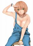  1girl between_legs blonde_hair bracelet breasts cleavage collarbone green_eyes hand_between_legs highres huge_breasts jewelry justin_(sera_tony) looking_at_viewer naked_overalls overalls salute short_hair sitting smile solo strap_slip white_background 