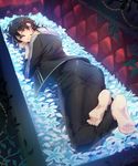  ass barefoot black_hair blue_flower coffin earrings ensemble_stars! feet_together feet_up flower jewelry looking_at_viewer looking_back lying male_focus on_stomach plant red_eyes rope sakuma_rei_(ensemble_stars!) smile solo tubuan_oisii vines wavy_hair 