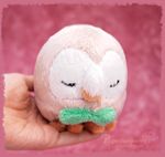  closed_eyes commentary gen_7_pokemon hand_made hands holding in_palm photo piquipauparro pokemon pokemon_(creature) pokemon_(game) pokemon_sm rowlet stuffed_toy unconventional_media watermark web_address 