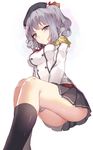  black_legwear blue_eyes hat highres hillly_(maiwetea) kantai_collection kashima_(kantai_collection) kneehighs silver_hair sitting skirt solo twintails two_side_up uniform wavy_hair 