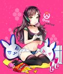  1girl animal_slippers bell bell_collar blizzard breasts brown_eyes brown_hair bubblegum bunny_slippers chips choker cleavage collar controller crop_top d.va_(overwatch) doritos duji_amo energy_drink facepaint food game_console game_controller gamepad headphones headset heart_in_eye highres logo long_hair navel overwatch pillow pink_background playing_games playstation_4 short_shorts shorts slippers solo symbol_in_eye thighhighs 