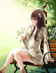  bench brown_eyes brown_hair dress flower hair_flower hair_ornament hair_twirling highres knees_together_feet_apart long_hair original outdoors profile sitting solo wsman 