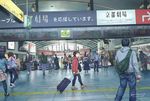  6+boys 6+girls backpack bag black_hair black_legwear blurry brown_hair clock commentary dated depth_of_field directional_arrow fare_gate handbag high_heels highres hood hoodie indoors kyoto long_hair looking_at_viewer looking_up multiple_boys multiple_girls no_eyes original pantyhose ramii real_world_location rolling_suitcase scenery security_camera shop short_hair sign signature skirt suitcase sweater tactile_paving train_station 