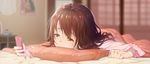  blurry breasts brown_hair cellphone depth_of_field hair_down highres hoshi_o_mite idolmaster idolmaster_cinderella_girls long_hair lying on_stomach pajamas phone pillow shimamura_uzuki sleepy small_breasts solo tears 