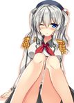  ;o blue_eyes blush epaulettes hat kantai_collection kashima_(kantai_collection) legs one_eye_closed ryokushiki_(midori-ya) short_hair silver_hair sitting solo twintails 