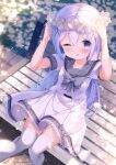 1girl ;d arms_up bangs blue_eyes blue_hair blurry blurry_background blush chinomaron commentary_request day depth_of_field dress feet_out_of_frame flower flower_wreath gochuumon_wa_usagi_desu_ka? grey_sailor_collar hair_between_eyes hair_ornament head_wreath highres jacket kafuu_chino long_hair looking_at_viewer on_bench one_eye_closed outdoors petals sailor_collar sailor_dress short_sleeves sitting smile solo thighhighs very_long_hair white_dress white_flower white_jacket white_thighhighs x_hair_ornament 