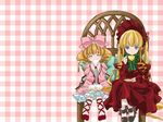  artist_request baozi blonde_hair blue_eyes blush bonnet bow bowtie chair checkered checkered_background closed_eyes cross-laced_footwear cup dress eating food frills full_body hat hat_bow hina_ichigo long_sleeves looking_at_viewer multiple_girls official_art pillow pink_background pink_bow pink_dress plate rozen_maiden saucer shinku simple_background sitting 