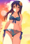  bikini black_hair blush breasts collarbone duffy flower from_below groin hair_flower hair_ornament highres long_hair looking_at_viewer love_live! love_live!_school_idol_project midriff navel ribbon small_breasts solo sonoda_umi standing swimsuit yellow_eyes 