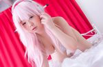  1girl asian bikini breasts cosplay large_breasts looking_at_viewer mana nitroplus photo solo super_sonico 