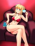  ahoge aqua_eyes ass bikini blonde_hair blush book breasts chair cleavage clenched_teeth crossed_legs fate/extra fate_(series) food highres large_breasts looking_at_viewer navel nero_claudius_(fate) nero_claudius_(fate)_(all) ngo popsicle red_bikini sitting solo swimsuit teeth 