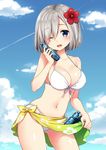  bikini blue_eyes blush breasts cleavage cloud cloudy_sky commentary_request day eyes_visible_through_hair flower front-tie_top hair_flower hair_ornament hair_over_one_eye hairclip hamakaze_(kantai_collection) highres kantai_collection large_breasts masuishi_kinoto multi-strapped_bikini navel one_eye_closed ramune sarong shiny shiny_skin short_hair skindentation sky solo swimsuit 