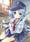  anchor_symbol barefoot blue_eyes flat_cap hat hibiki_(kantai_collection) highres hizuki_yayoi kantai_collection long_hair looking_at_viewer papico_(ice_cream) school_uniform serafuku silver_hair sitting solo wariza 