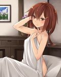  arm_up bed_sheet blush body_blush brown_eyes brown_hair collarbone flower hair_ornament hairclip hand_in_hair holding ikazuchi_(kantai_collection) indoors kantai_collection long_hair looking_at_viewer naked_sheet older on_bed photo_(object) pillow short_hair sitting smile solo yasu_(yossy) 