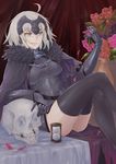  absurdres ahoge armor blonde_hair breasts cape fate/grand_order fate_(series) flower fur-trimmed_cape fur_trim highres hourglass jeanne_d'arc_(alter)_(fate) jeanne_d'arc_(fate)_(all) large_breasts petals short_hair skull smirk sneer solo thighhighs thighs weaponman yellow_eyes 