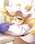  animal_ears blonde_hair blush book closed_mouth commentary_request fox_ears fox_girl fox_tail hat liya long_sleeves looking_at_viewer multiple_tails one_eye_closed open_book pillow_hat short_hair solo tail tassel touhou upper_body waking_up wide_sleeves yakumo_ran yellow_eyes 