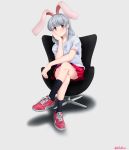  1girl animal_ears bad_hands balladeluce black_legwear blue chair fake_animal_ears full_body grey_background highres legs_crossed looking_at_viewer original pink_eyes red_footwear red_skirt reebok shadow shirt shoes silver_hair simple_background sitting skirt smile sneakers socks solo swivel_chair t-shirt twitter_username white_shirt 