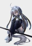  ahoge bell black_gloves black_legwear capelet fate/grand_order fate_(series) gloves haruato helmet highres jeanne_d'arc_(fate)_(all) jeanne_d'arc_alter_santa_lily knees_up long_hair looking_at_viewer silver_hair sitting solo thighhighs very_long_hair yellow_eyes 