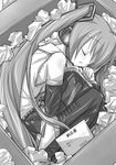  box crumpled_paper detached_sleeves eeeeee greyscale hatsune_miku headphones highres in_box in_container long_hair monochrome sleeping solo thighhighs translation_request twintails very_long_hair vocaloid 
