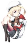  bangs beret black_legwear black_skirt blonde_hair blue_eyes capelet eyebrows_visible_through_hair fueru_nattou graf_zeppelin_(kantai_collection) hat kantai_collection kneehighs knees_up long_hair long_sleeves looking_at_viewer military_hat no_shoes object_hug parted_lips simple_background skirt soles solo stuffed_animal stuffed_toy teddy_bear twintails wavy_hair white_background younger 