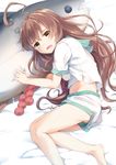  ahoge barefoot bed_sheet brown_eyes brown_hair commentary_request drooling gedou_(shigure_seishin) kantai_collection kuma_(kantai_collection) long_hair looking_at_viewer lying open_mouth pillow shorts solo stuffed_animal stuffed_fish stuffed_toy waking_up 