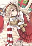  alternate_costume bandages boko_(girls_und_panzer) brown_eyes brown_hair christmas commentary_request girls_und_panzer hair_ribbon hairband long_hair long_sleeves looking_at_viewer lying mitsuki_yuu on_side ribbon shimada_arisu side_ponytail solo striped striped_legwear stuffed_animal stuffed_toy teddy_bear 