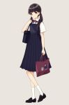  1girl bag bangs black_dress blush brown_background brown_eyes brown_footwear brown_hair closed_mouth collared_shirt commentary_request dress dress_shirt eyebrows_visible_through_hair full_body head_tilt holding holding_bag kashiwagi_chisame loafers long_hair low_twintails original pinafore_dress pleated_dress school_bag shirt shoes short_sleeves simple_background smile socks solo standing twintails white_legwear white_shirt 