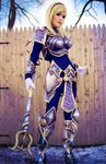  1girl armor blonde_hair bodysuit boots cosplay danielle_beaulieu hair_ornament league_of_legends lipstick looking_at_viewer luxanna_crownguard make_up outdoor staff tagme 
