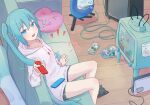  1girl amplifier animal_slippers blue_eyes blue_hair cable cat_slippers couch fang guitar handheld_game_console hatsune_miku heart heart-shaped_pillow highres holding hood hoodie indoors instrument kagamine_rin konami_code long_hair looking_at_viewer mario_(series) nintendo_switch nintendo_switch_dock open_mouth pillow shorts sitting slippers smile solo television translation_request twintails very_long_hair vocaloid yasuno-labo 