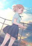  1girl absurdres blue_ribbon blue_skirt bob_cut brown_eyes chain-link_fence cloud cloudy_sky collared_shirt commentary dutch_angle feet_out_of_frame fence from_behind gradient_sky hechima_(issindotai) highres light_brown_hair light_smile looking_at_viewer looking_back loose_hair_strand miniskirt motokano_ga_tenkou_shitekite_kimazui_kogura_richi_no_wana_to_koi. neck_ribbon official_art outdoors pleated_skirt ribbon school_uniform shibuya_nairu shirt shirt_tucked_in short_hair short_sleeves sidelocks skirt sky solo standing steepled_fingers white_shirt 