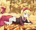  bell blonde_hair blue_eyes blush boots chin_rest cross-laced_footwear forest hair_ribbon lace-up_boots leaf looking_at_viewer lying medicine_melancholy mito_tsubaki nature on_stomach open_mouth ribbon solo touhou 