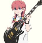  1girl bocchi_the_rock! braid clothes_writing cube_hair_ornament electric_guitar eyes_visible_through_hair gibson_les_paul guitar hair_ornament hair_over_eyes hand_up highres hitori_bocchi holding holding_guitar holding_instrument instrument long_hair looking_at_viewer nekoko_samurai pink_hair shirt simple_background solo standing t-shirt twin_braids watch white_shirt wristwatch yellow_background 