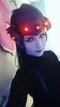  1girl cosplay helmet looking_at_viewer makeup overwatch photo purple_skin ruhira smile widowmaker_(overwatch) yellow_eyes 