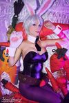  1girl adami_langley animal_ears bunnysuit carrot cosplay league_of_legends leotard looking_at_viewer lying nail_polish pantyhose photo riven_(league_of_legends) short_hair white_hair 