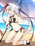  adapted_costume ahoge alternate_costume ass bangs barefoot beach bell bikini black_bikini black_legwear blonde_hair blurry blush bow breasts cleavage commentary_request day depth_of_field eyebrows_visible_through_hair fate/grand_order fate_(series) green_bow green_ribbon headpiece holding holding_umbrella jeanne_d'arc_(fate)_(all) jeanne_d'arc_alter_santa_lily kneeling long_hair looking_at_viewer navel ocean open_mouth outdoors red_bow red_ribbon ribbon saipaco small_breasts smile solo striped striped_bow striped_ribbon swimsuit teeth thighs toeless_legwear umbrella very_long_hair yellow_eyes 