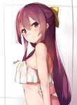 arms_behind_back blush bow commentary crop_top crop_top_overhang from_side hair_bow highres kamikaze_(kantai_collection) kantai_collection long_hair looking_at_viewer looking_back orihi_chihiro purple_eyes purple_hair smile solo swimsuit twitter_username upper_body white_background 