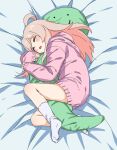  1girl ahoge bed_sheet blush closed_eyes commentary_request genderswap genderswap_(mtf) highres hugging_object long_hair lying on_bed on_side onii-chan_wa_oshimai! open_mouth oyama_mahiro pink_hair pink_sweater sleeping sleeves_past_wrists socks sody solo stuffed_toy sweater white_socks 