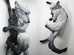  2012 ambiguous_gender beth_cavener_stichter black_fur canine chest_tuft claws cuddling duo facial_markings feral fur greyscale lagomorph long_ears looking_at_viewer looking_back lying mammal markings monochrome multiple_images on_top pose protective rabbit real restricted_palette sculpture_(artwork) simple_background size_difference socks_(marking) traditional_media_(artwork) tuft white_fur wolf 