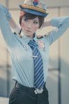  1girl adjusting_hair arms_up asian belt breast_pocket breasts brown_hair cosplay d.va_(overwatch) necktie officer_d.va overwatch pants police police_uniform policewoman whisker_markings 