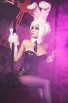  1girl animal_ears belt breasts bunny_ears bunnysuit christina_fink cleavage cosplay league_of_legends leotard pantyhose photo purple_eyes riven_(league_of_legends) short_hair sitting solo steam white_hair 